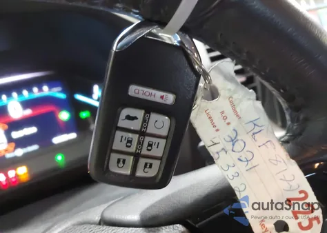 2021 Honda Odyssey Touring z USA, uszkodzony, nr VIN 5FNRL6H83MB028264